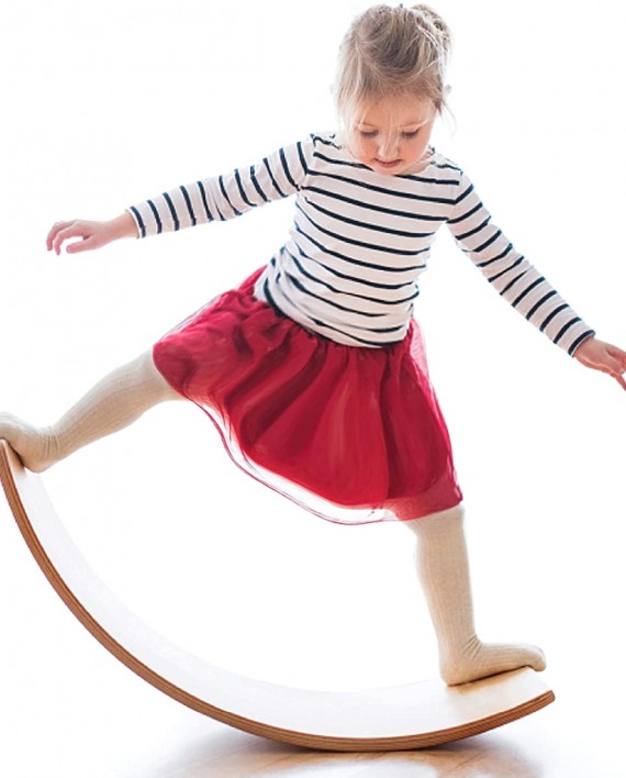 girl on rocker board